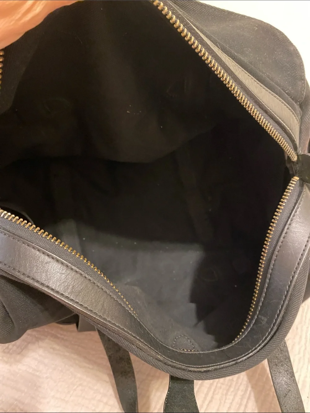 FILSON  BLACK TWILL DUFFLE BAG .